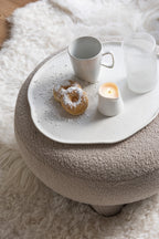Ronde kruk teddy-poten bouclé warm beige