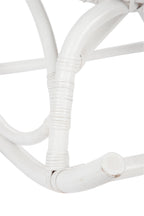 Witte rotan schommelstoel