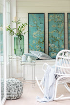 Witte rotan schommelstoel